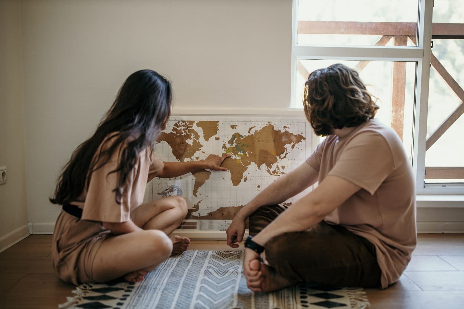 An older couple studying a map together