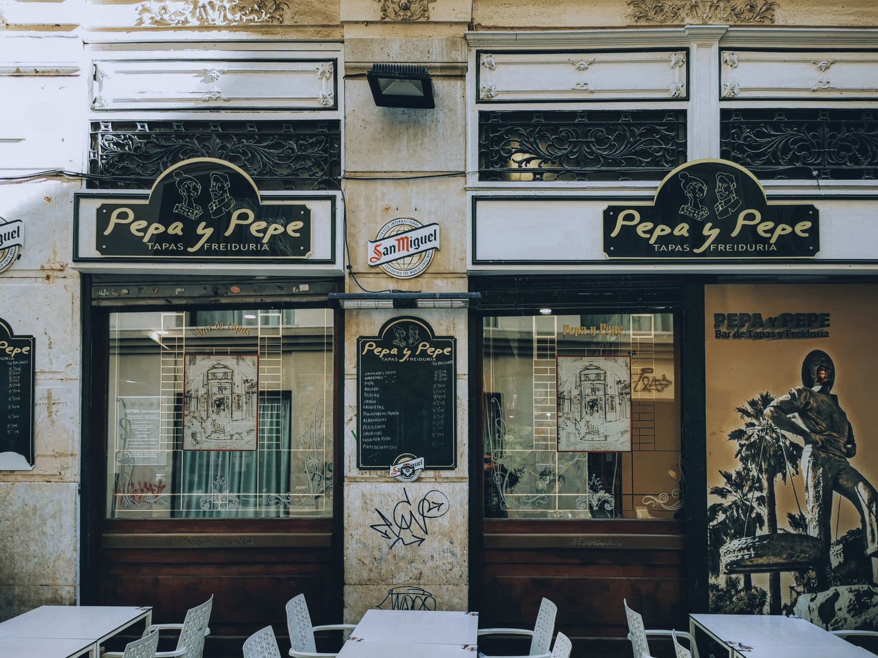 Tax consultancy office storefront on a street in Valencia, Spain